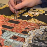 Student works on collage (above).