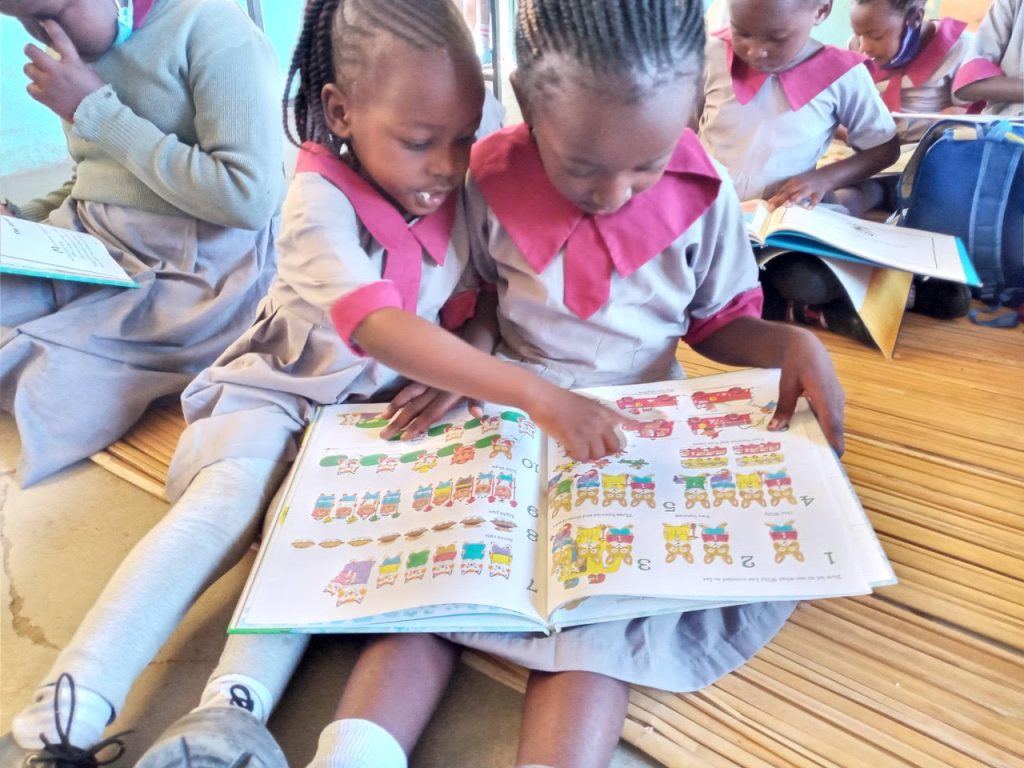 African Library Project girls reading books